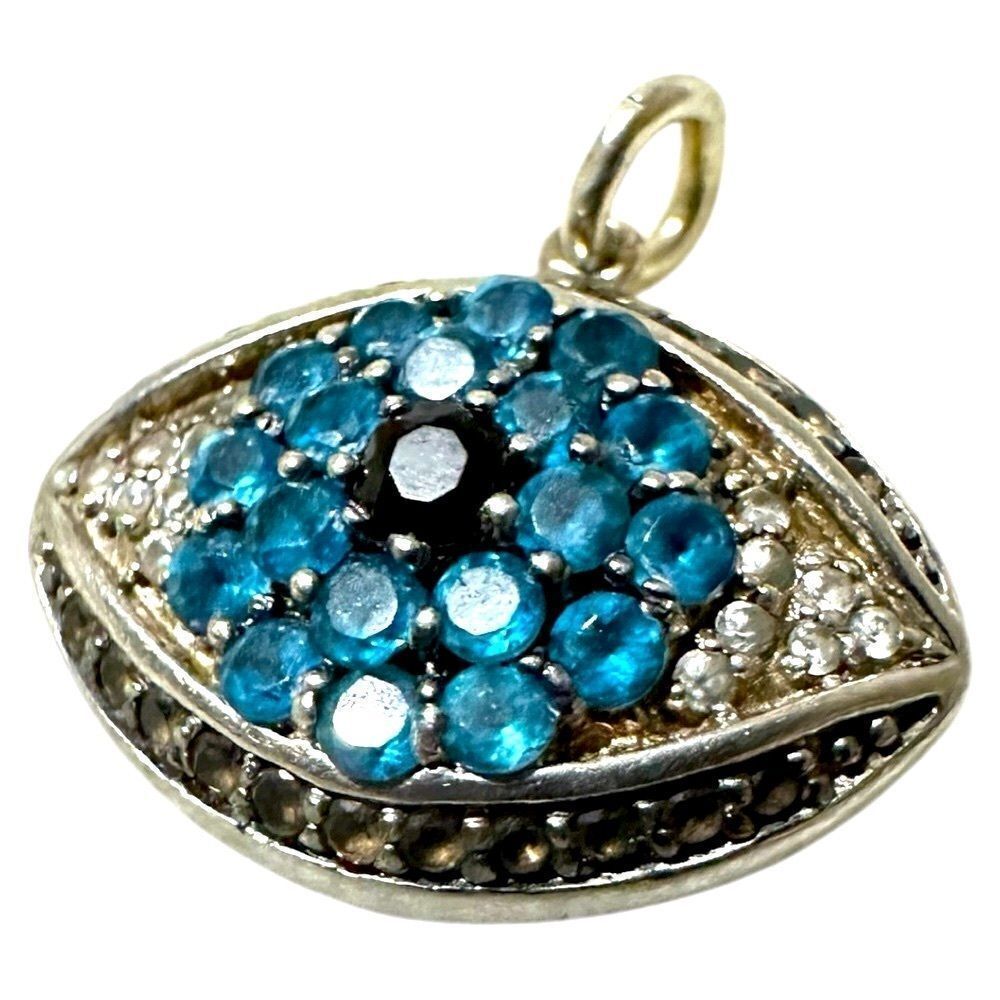 Silver and Blue Evil Eye Necklace with Gemstone Cluster